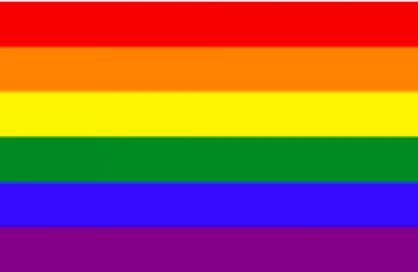 The LGBTQ rainbow flag with six stripes: red, orange, yellow, green, blue, purple