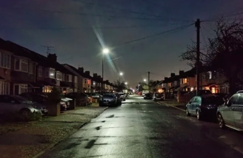 Photo of a dark residential street in the borough with current too low lighting levels.