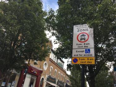 Signage at the entrance to Devonshire Road, off Chiswick High Road